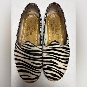 Sabah Safari pony calf hair flats with a zebra print pattern. Women’s Size 40 EU